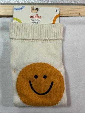 Oodles Cream Dog Sweater with Orange Smiley
